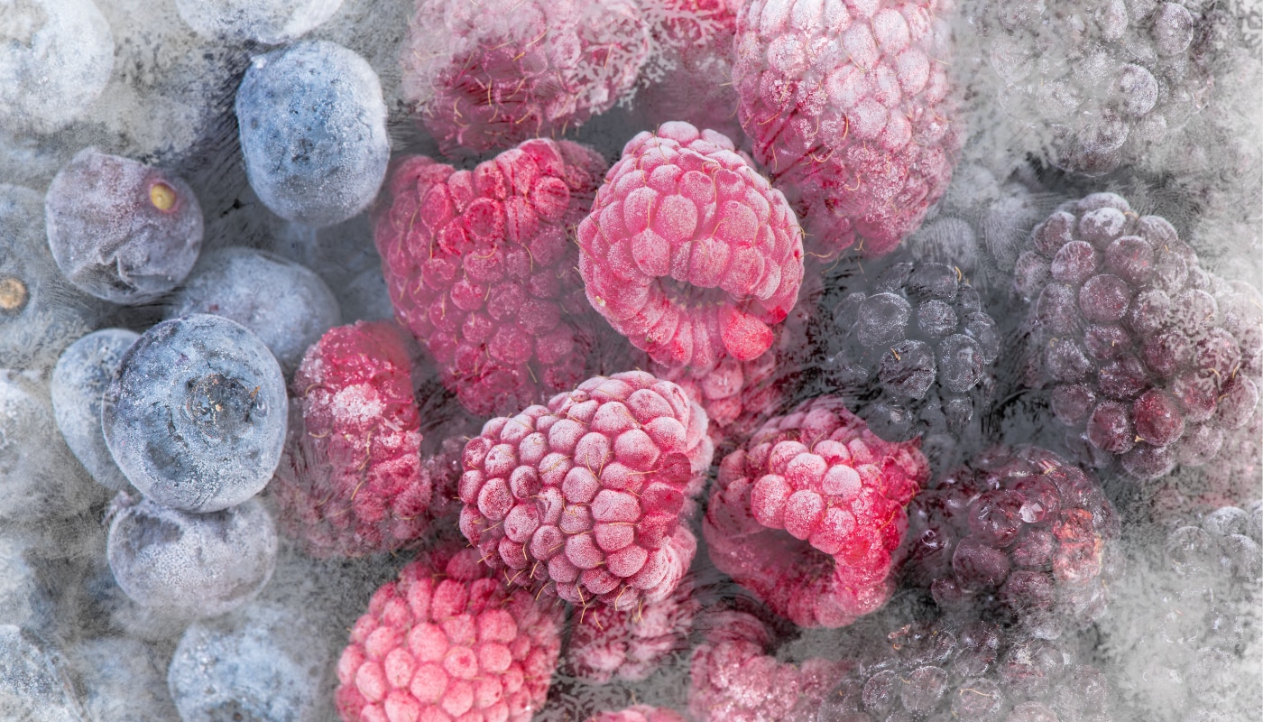 Frozen berries with ice crystals
