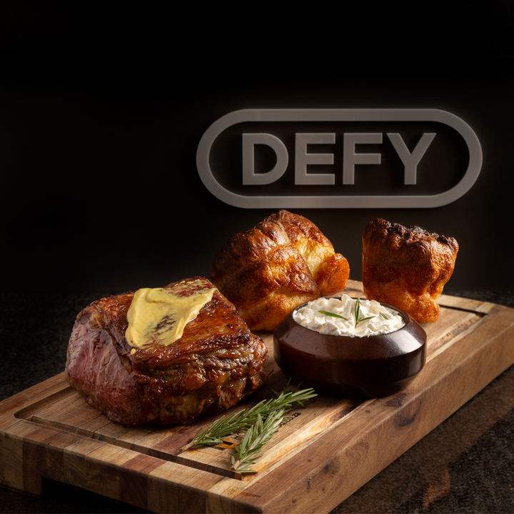 England Yorkshire Puddings Served with Beef Slices and Horseradish Cream