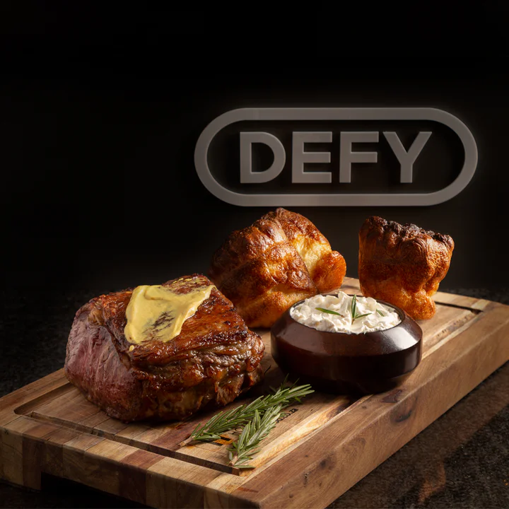 England Yorkshire Puddings Served with Beef Slices and Horseradish Cream