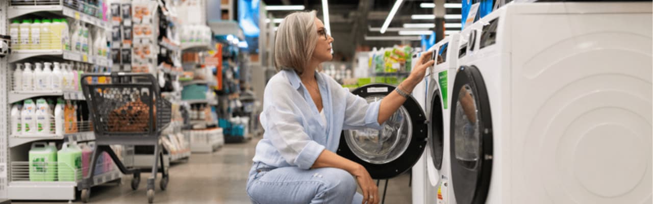 woman choosing a washing machine
